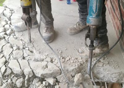 Men working with jackhammer